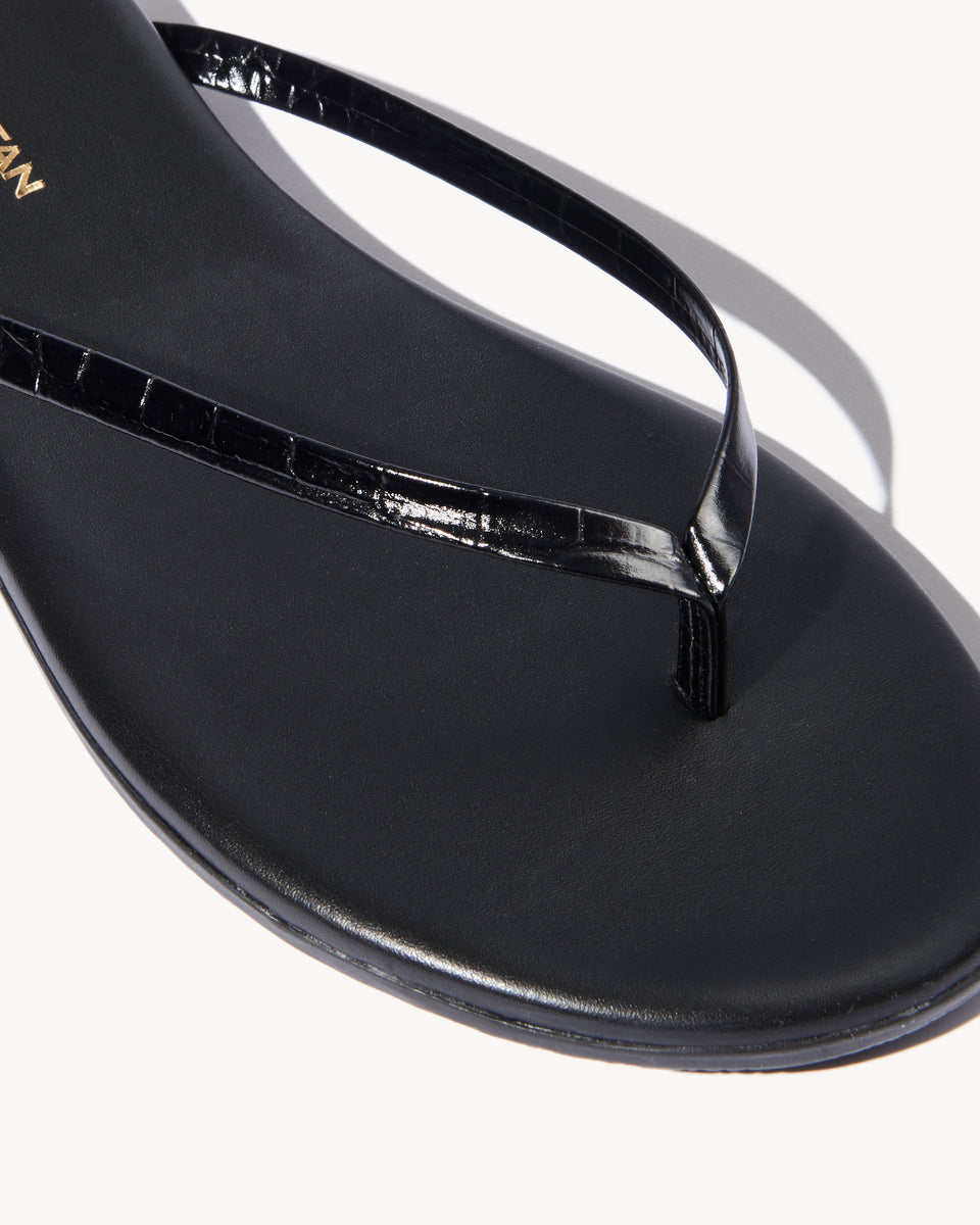 NL X TKEES LEATHER FLIP FLOP IN BLACK