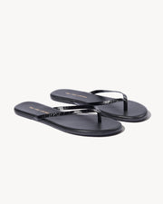 NL X TKEES LEATHER FLIP FLOP IN BLACK