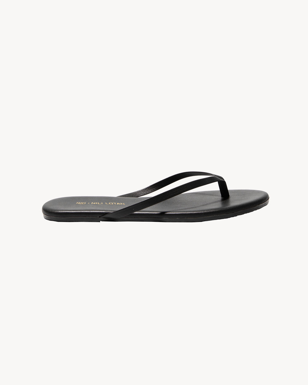 NL X TKEES LEATHER FLIP FLOP IN BLACK