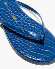 NL X TKEES LEATHER FLIP FLOP IN NAVY