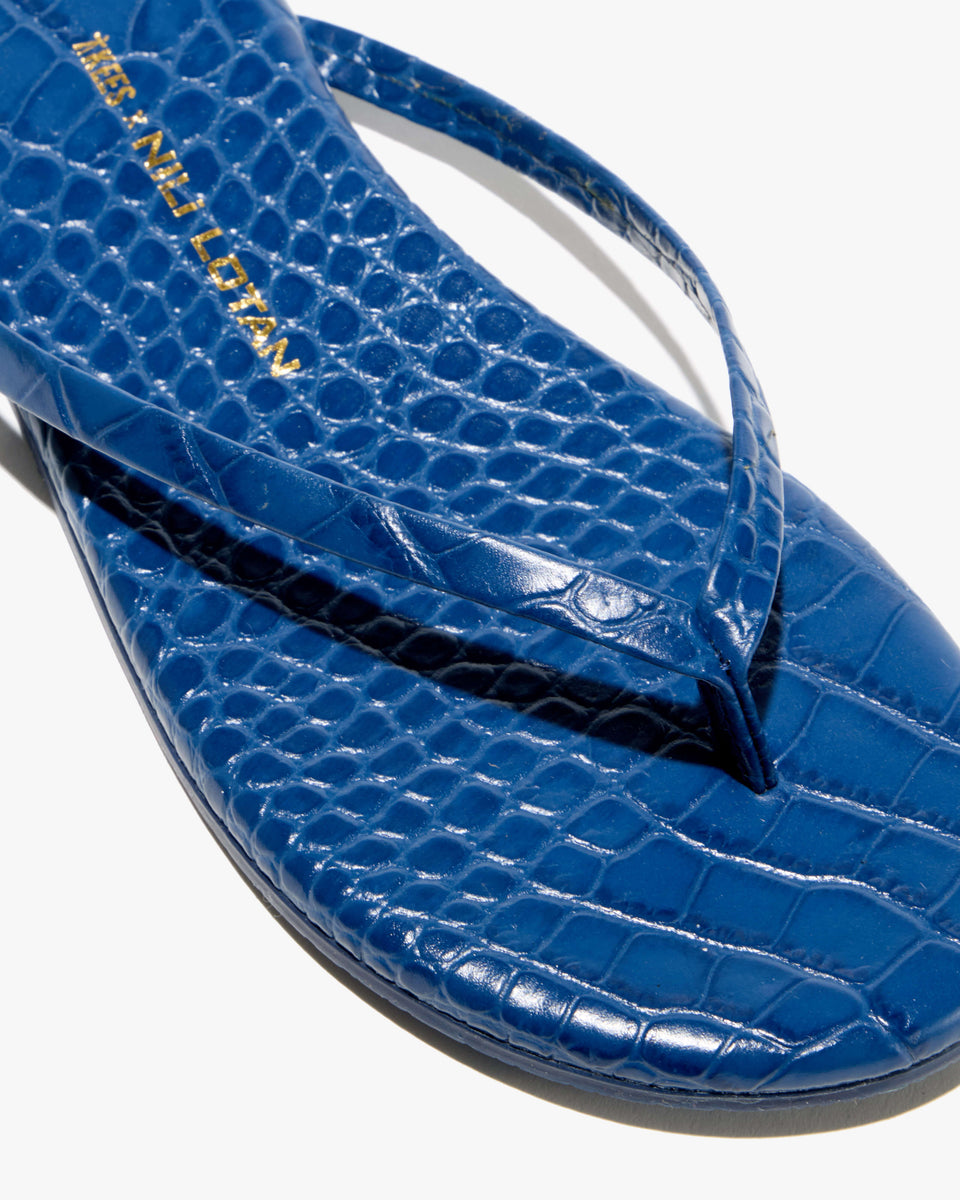 NL X TKEES LEATHER FLIP FLOP IN NAVY