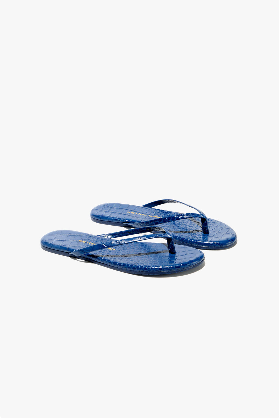 NL X TKEES LEATHER FLIP FLOP IN NAVY