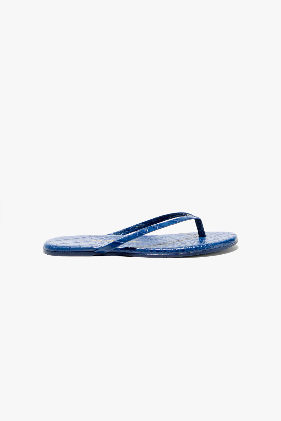 NL X TKEES LEATHER FLIP FLOP IN NAVY