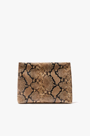 JERRY CLUTCH IN TAUPE SNAKESKIN