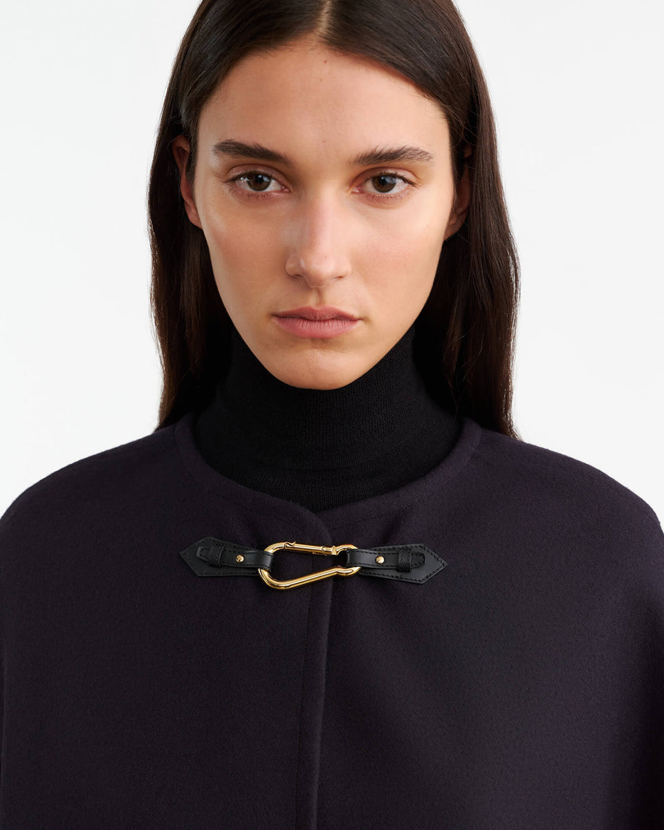 ARIANNA CAPE IN DARK NAVY