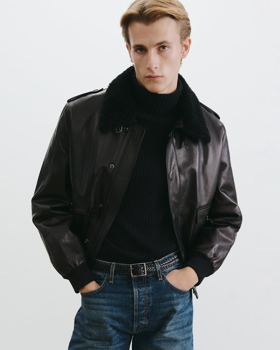 COLE CASHMERE TURTLENECK SWEATER IN BLACK
