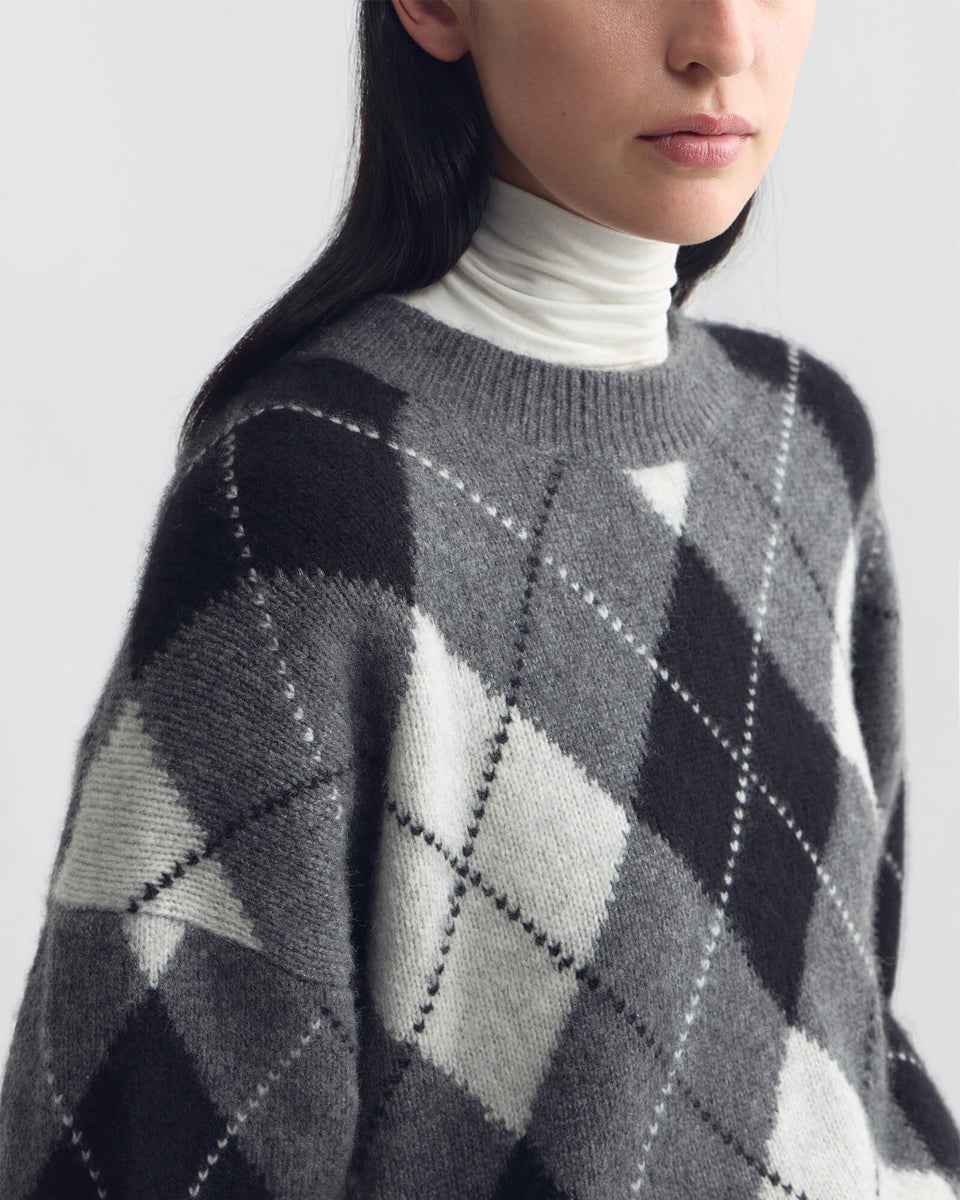 DONNIKA ARGYLE SWEATER IN CHARCOAL ARGYLE