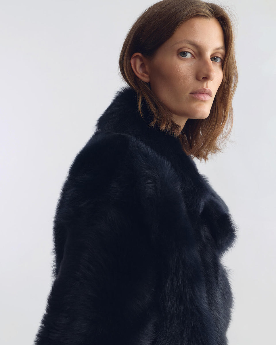 LUCE SHEARLING SHORT COAT IN MIDNIGHT