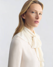 LYA RUFFLE TIE SILK BLOUSE IN IVORY