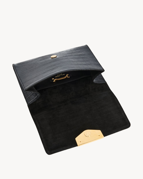 LE AGNES CLUTCH IN BLACK AND GOLD